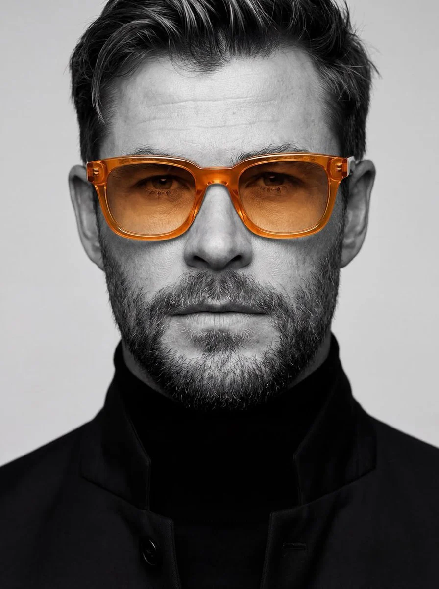 An ultra-realistic monochrome man portrait with amber glasses, featuring sharp details, high contrast lighting, and a shallow depth of field, generated by AI.